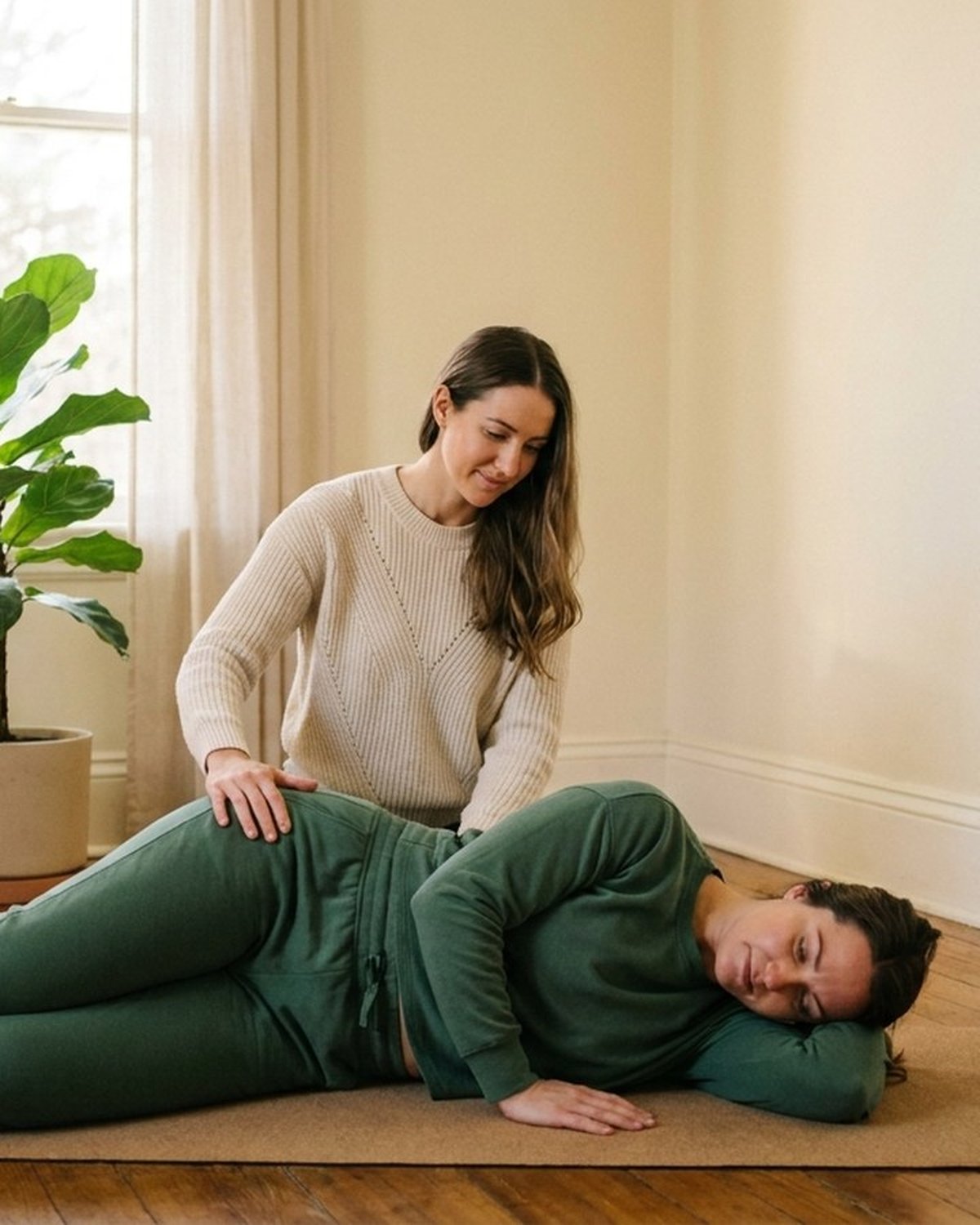Postnatal and perimenopause client performing R.Kin-supervised core and pelvic floor reconditioning in a private Ontario home
